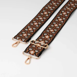 769515 Skulderrem med blomstermønster - svart/cognac